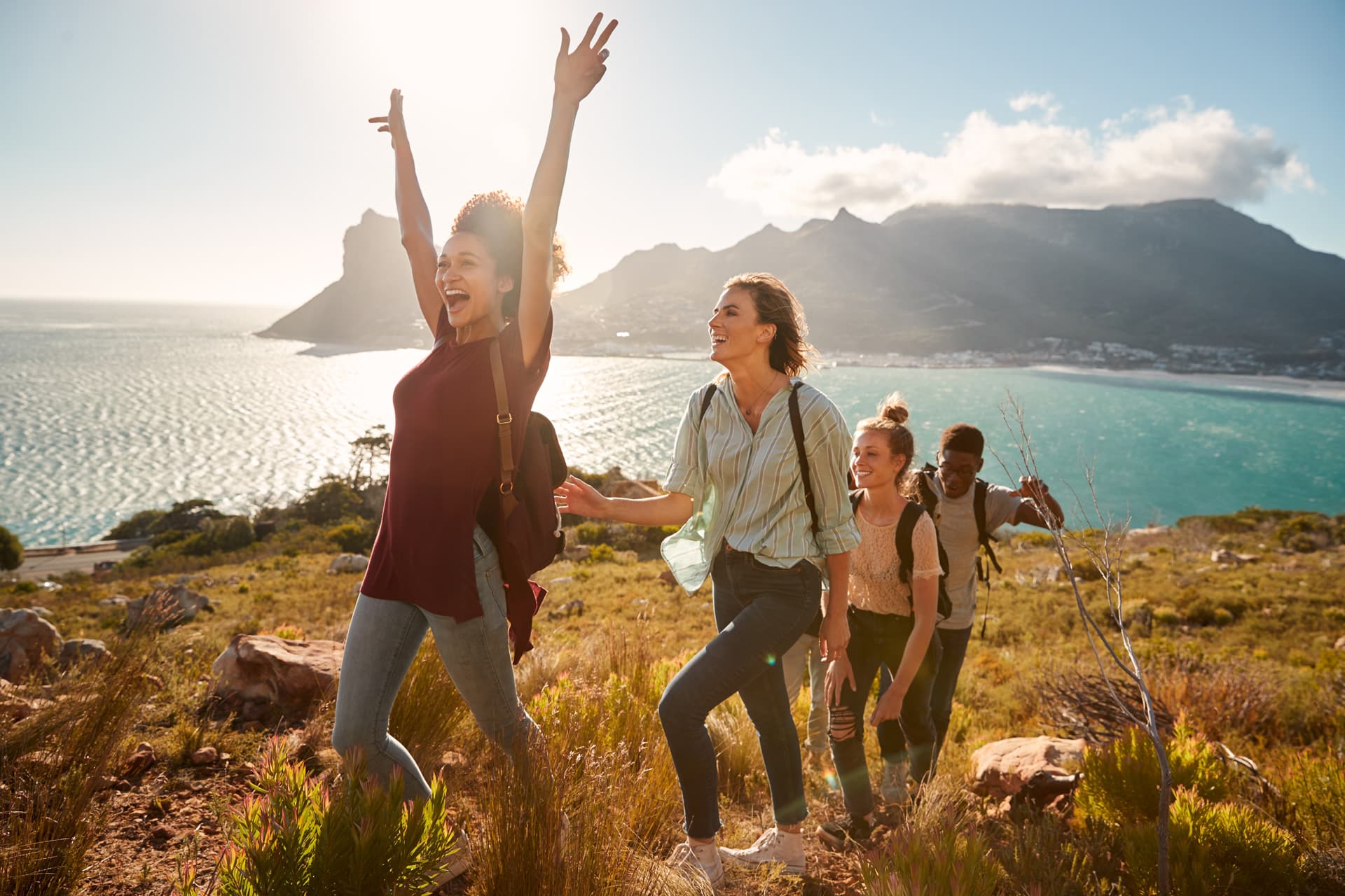 young-adult-friends-hiking-single-file-uphill-cele-2026-03-10-03-22-39-utc